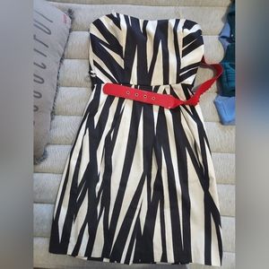 Black and white cocktail dress with red belt